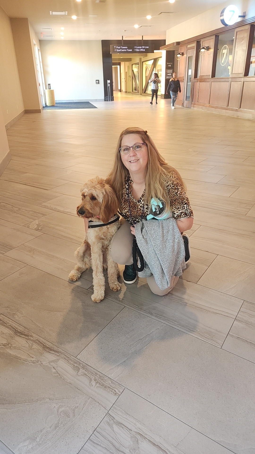 Laura and Brandy together in a hotel lobby.